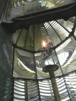 Looking up inside of the Heceta lighthouse, fresnel lens.