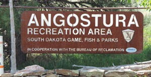 Entry sign for the main park, across the lake from us.