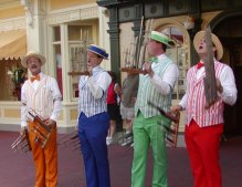 A barbershop quartet that is typical of the roving street entertainers found in all four parks.