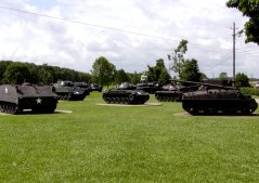 Field display of armored vehicles from world war two to Vietnam.