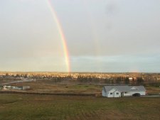 Viewing a rainbow from the deck at our son's home in Sequiem, Wa.