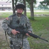 The combat medic, training at Ft. Hood for deployment to Iraq. (click for his official photo)